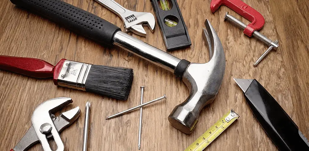 Handyman tools laid out for home repair and maintenance work in Kansas City, MO