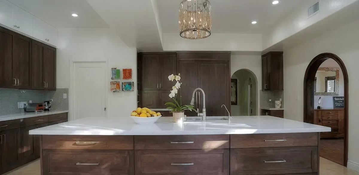 Cabinet refacing project with updated kitchen cabinets and island in Kansas City, MO